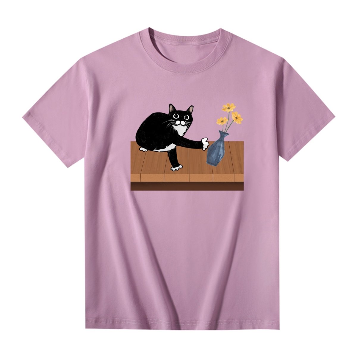 Purple unisex T-shirt with cartoon wide-eyed cat about to push a vase off a table, funny graphic tee for cat lovers