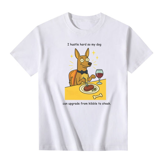 Funny white unisex T-shirt featuring bold text 'I Hustle Hard So My Dog Can Eat Steak' with a smiling yellow dog enjoying steak and wine.