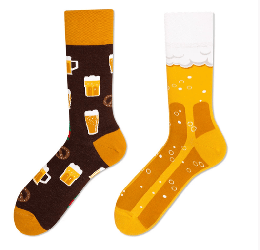 Mismatched beer socks with fun pint and pretzel design – one sock with beer mugs, the other with foamy beer glass, unisex novelty gift

