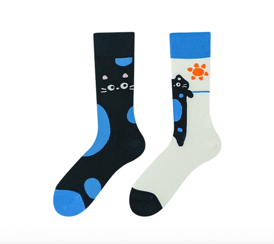 Mismatched cat socks with cute black cat design – one sock with peeking cat face, the other with stretching cat and sun, unisex novelty gift

